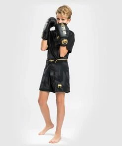 Venum Razor Kids MMA Shorts - Black/gold 13 Venum Razor Kids MMA Shorts - Black/gold -Fighters Europe Store 0935d92dfa81851af1e72824a504a549458be902 FS RAZOR BLACK 01