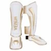 Venum ELITE Shin Guards - White/gold 1 Venum ELITE Shin Guards - White/gold -Fighters Europe Store 16818a11206f90dace98e35fbbd6a39131f7c250 IMG 0307 2 copie