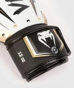 Venum Boxing Gloves Elite Evo - White 11 Venum Boxing Gloves Elite Evo - White -Fighters Europe Store 7454972a0b4bad60ddd9acf8875a4a6b92e7dc42 BG ELITE EVO WHITE GOLD 03
